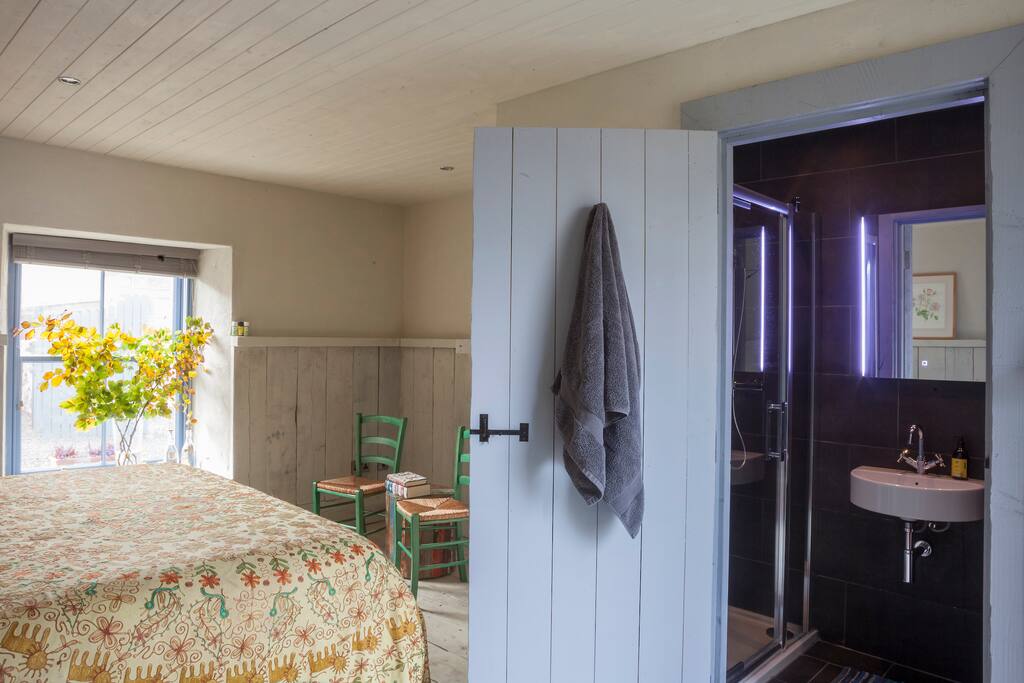 Each room has a super-king sized bed with crisp white lined, quirky rustic interior and ensuite bathroom.