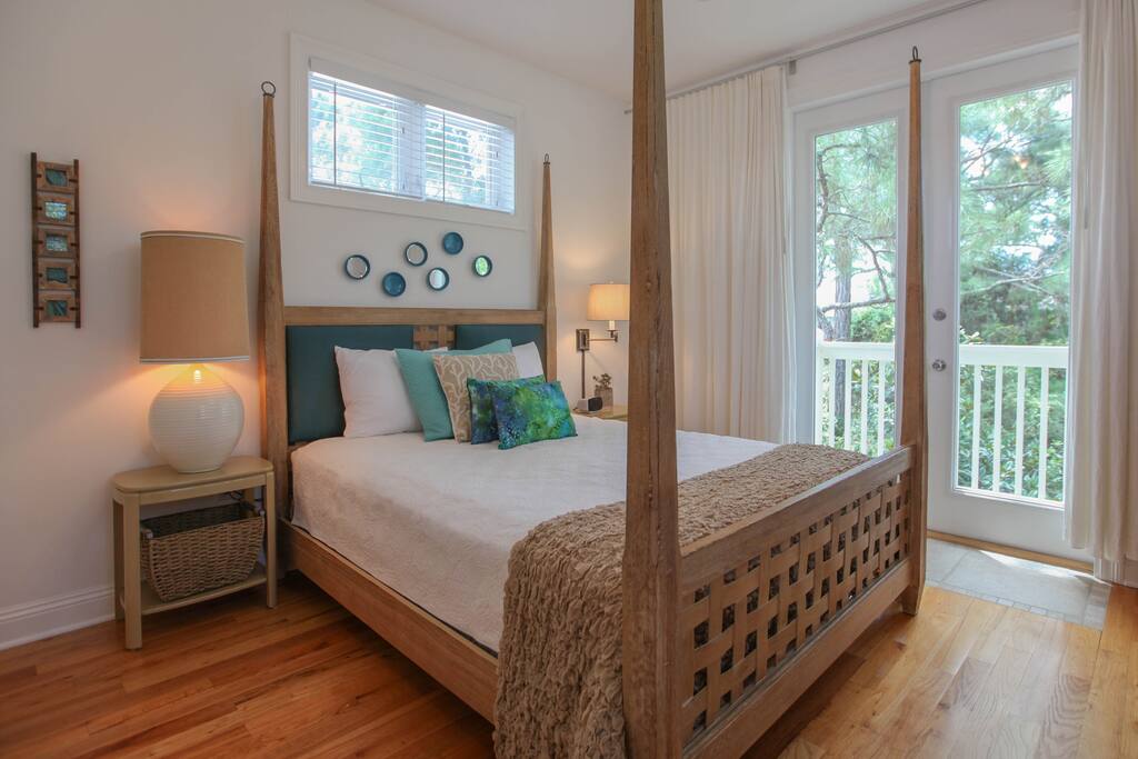 second floor master with queen and private deck