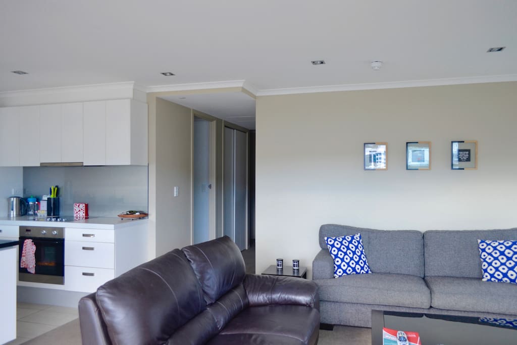 The open plan layout, the kitchen opening out onto the living space and getting the same amount of beautiful afternoon sun.