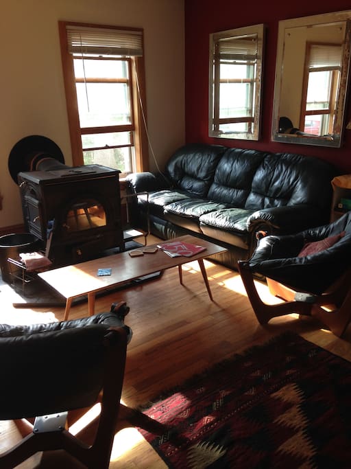 Sunlit living room, wood stove