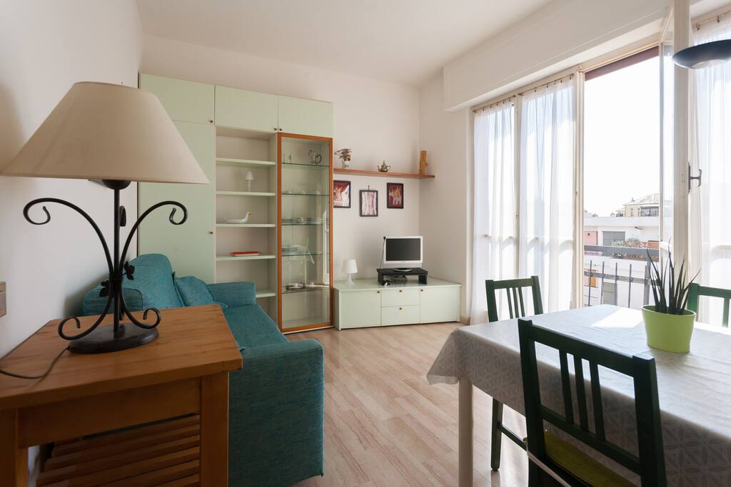 The Living room - The dining table & the sofa