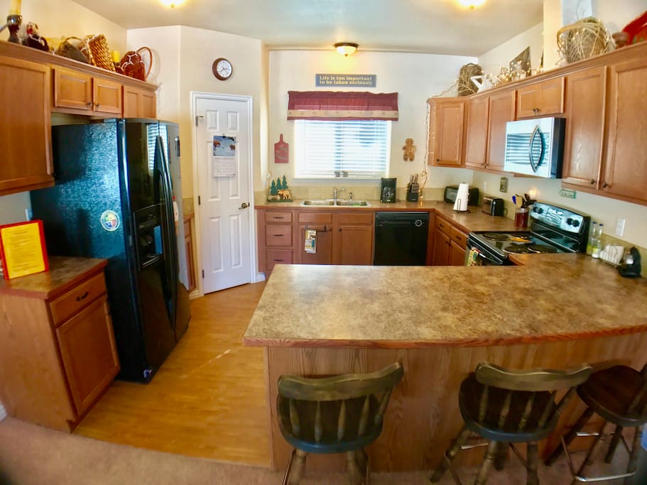 Fully appointed kitchen with dishes, pots and utensils. Just bring your food!