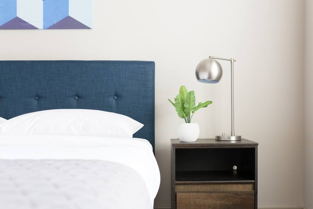 Extremely comfortable king bed with nightstands with built-in USB chargers.
