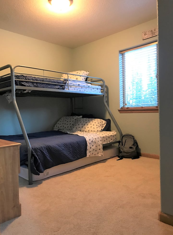 Full over twin Bunk room for multiple people or kids with another twin to pull out below