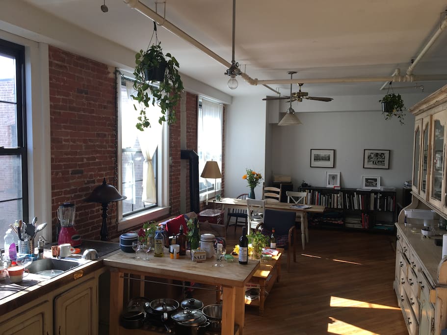 Communal kitchen, living room, and dining room.