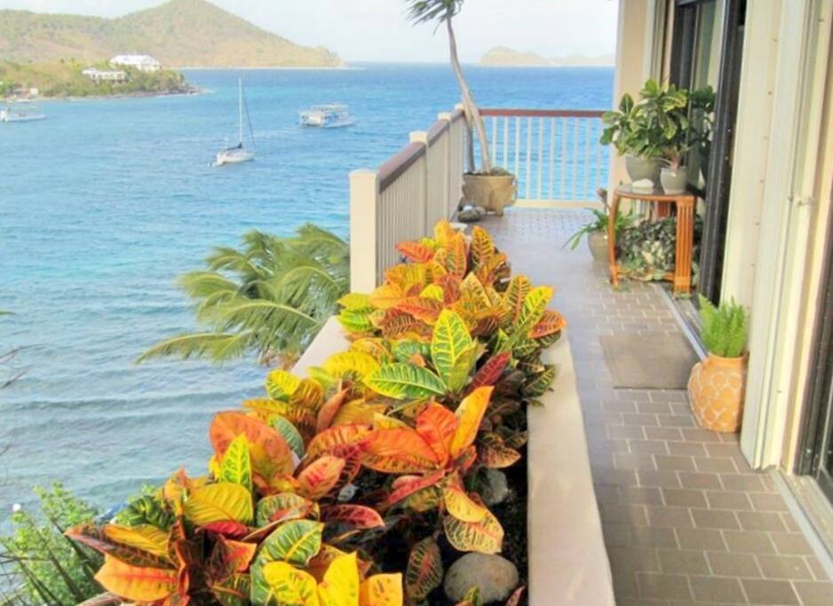 Enjoy drinks on the balcony overlooking the ocean and islands (including a views of St John and Tortola).
