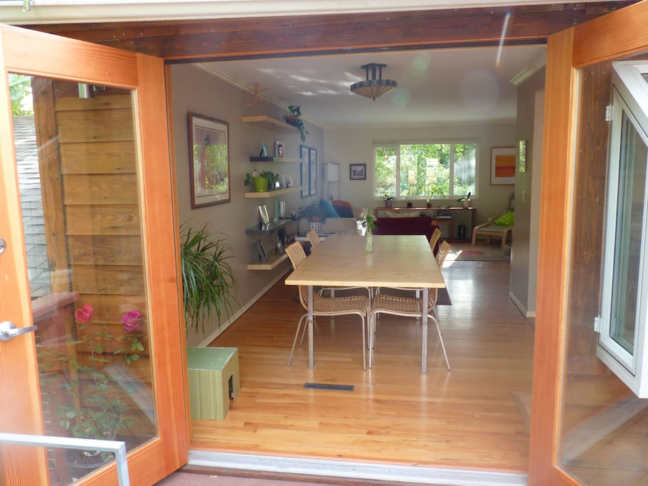 View into dining room and living room from deck