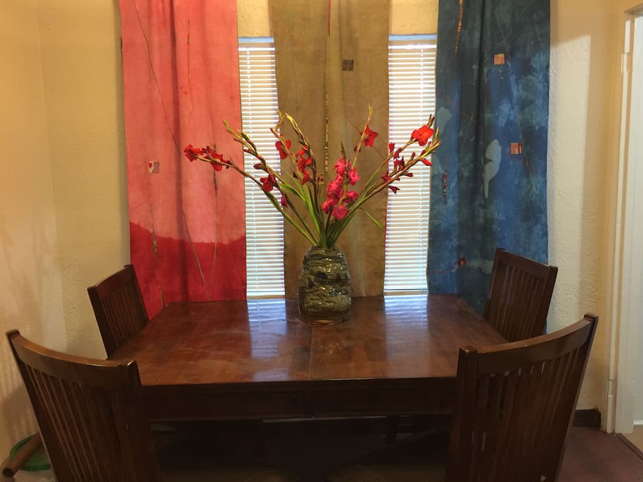 dining table with handmade hand dyed linen curtains