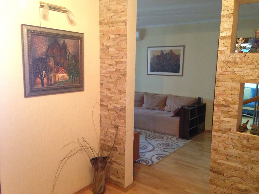view from the hall to the 1 bedroom and slight view of 2 bedroom