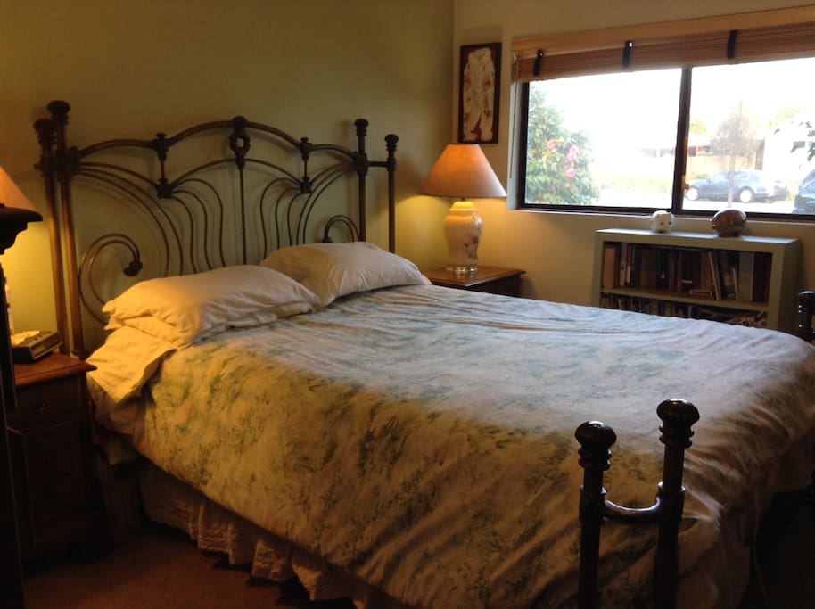 Cozy Queen bed.