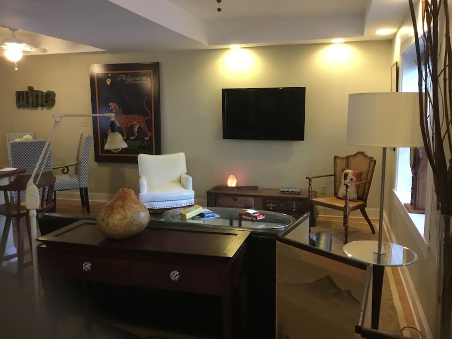 The living area is roomy and extra chairs from the dining room can be pulled up.
