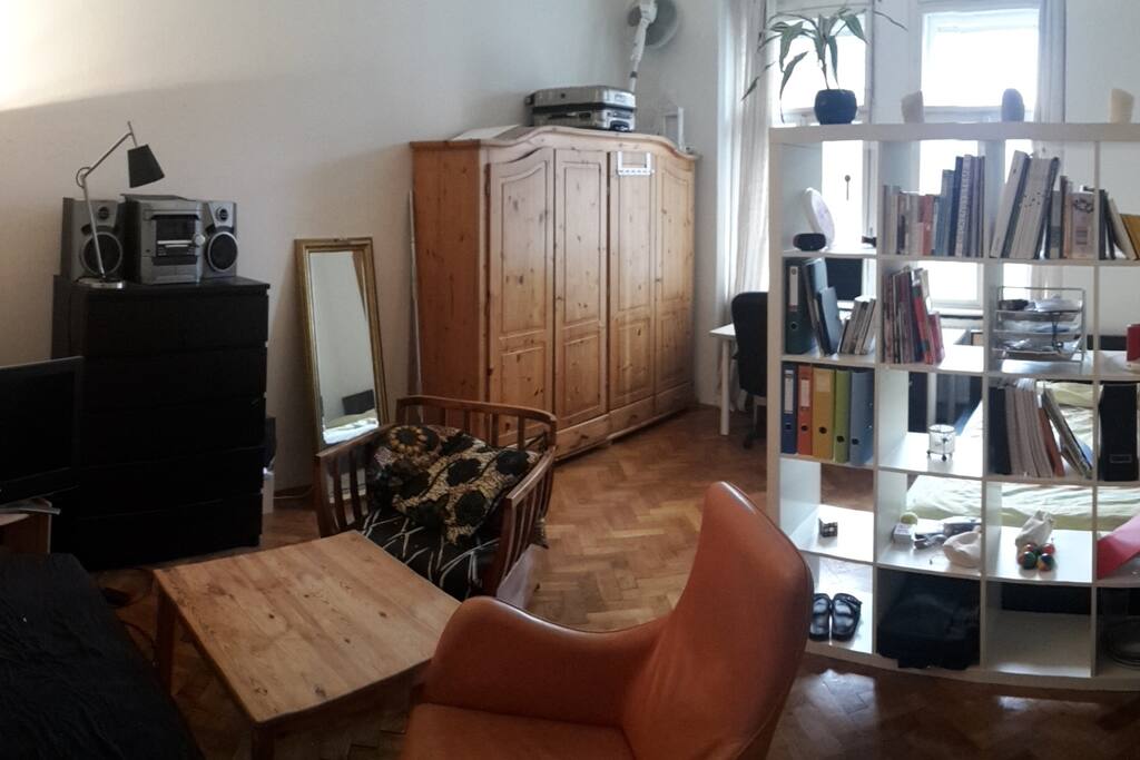 The whole room with the couch area.