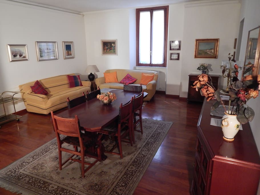 Entrance to the apartment.Living Room with a double sofa bed,dining table