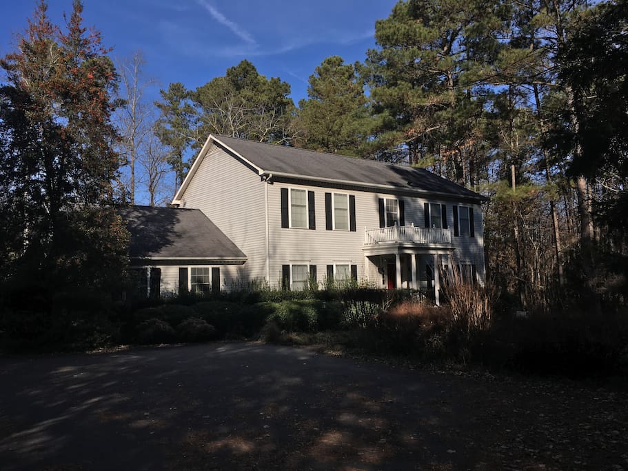 The Cowbell Inn is a Southern Colonial style home set on 4.5 wooded acres.