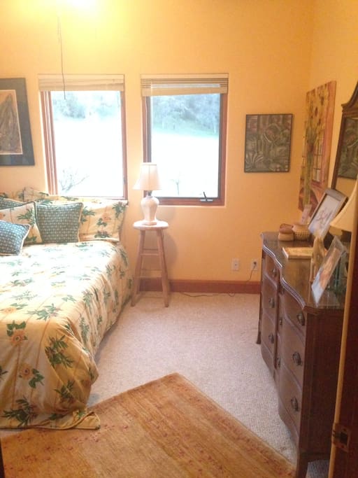 The room is spacious an decorated with original art and antiques.