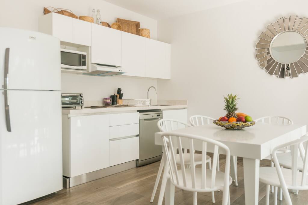 Dinning area with a fully equipped kitchen