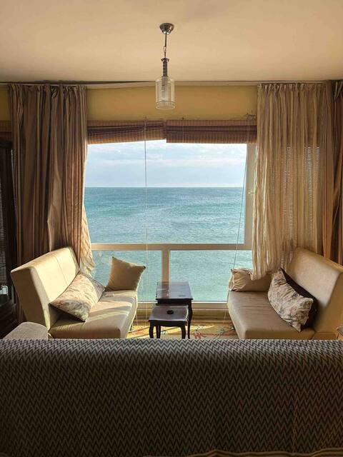 Beach & pool in front of the sea