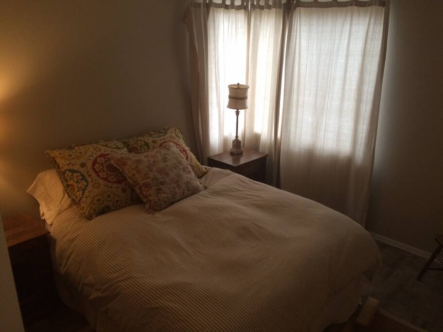 Guest room, queen bed, shared bath.