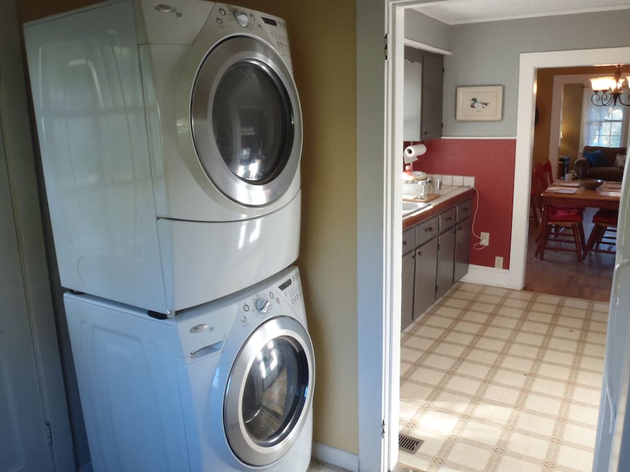 Stacked washer and dryer in mud-room
