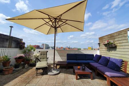 Room with private living-room and roof terrace.