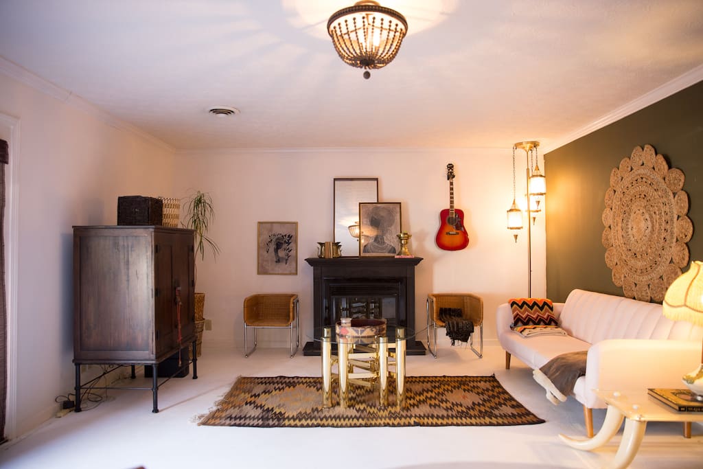 Spacious & stylish living area- electric fireplace works! Feel free to play the guitar! Tv with Netflix & basic cable as well as a selection of dvds for your enjoyment!