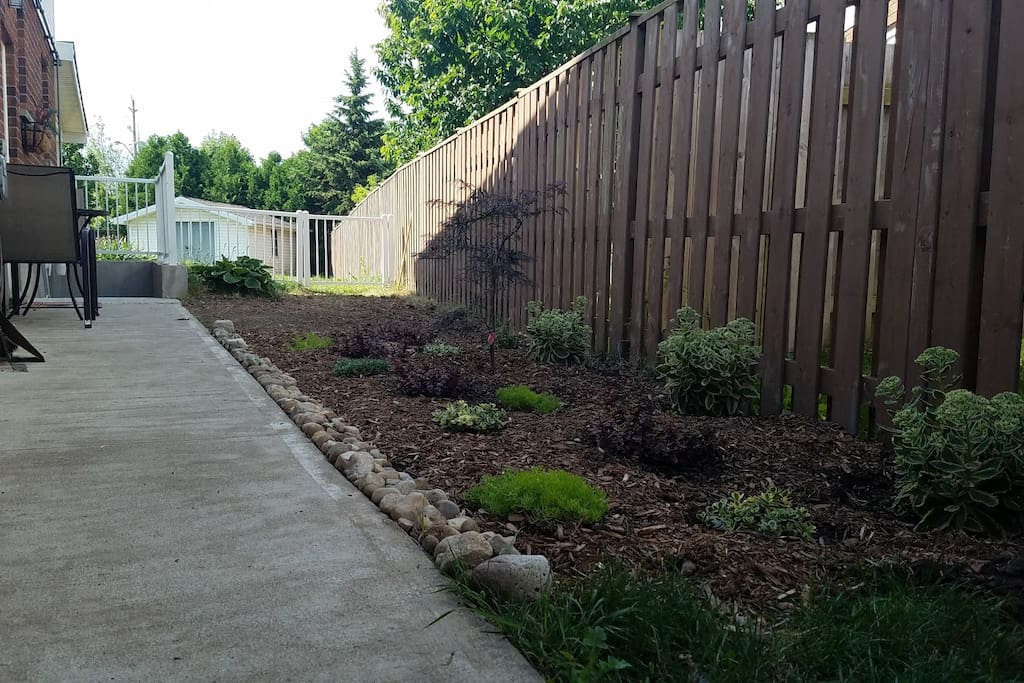 Feel free to kick back and relax next to a lovely garden!