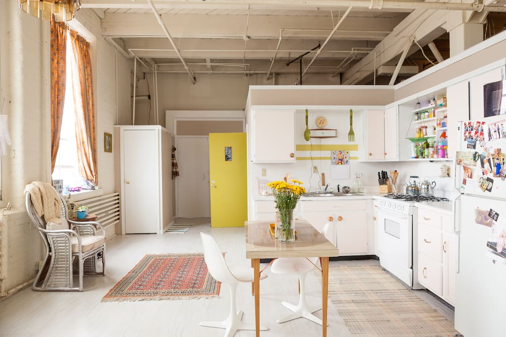 kitchen // breakfast table // green door is entrance to bathroom