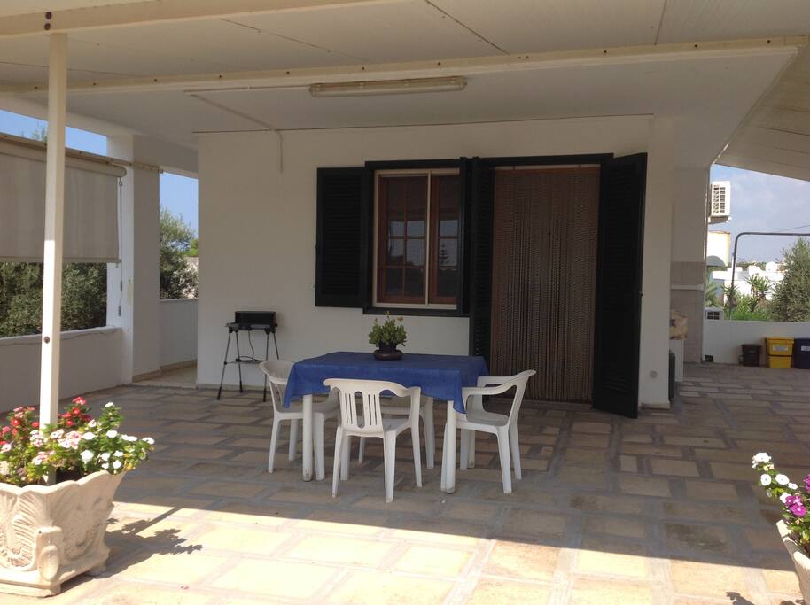 Terrazza/solarium coperta attrezzata con Bbq e mobili da giardino