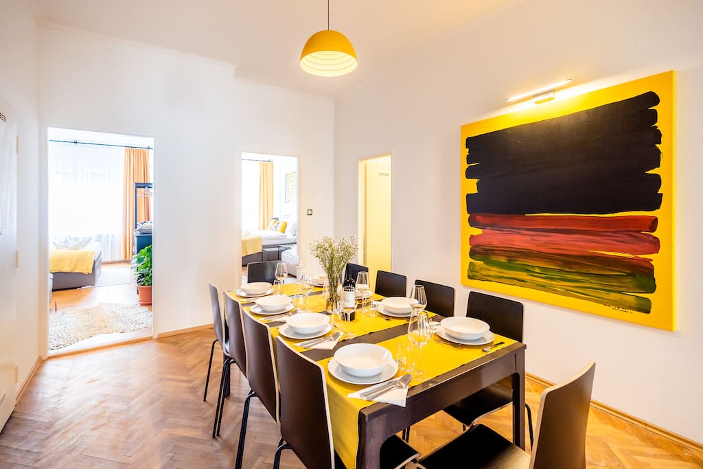 Spacious dining area comfortably sits 10 guests.