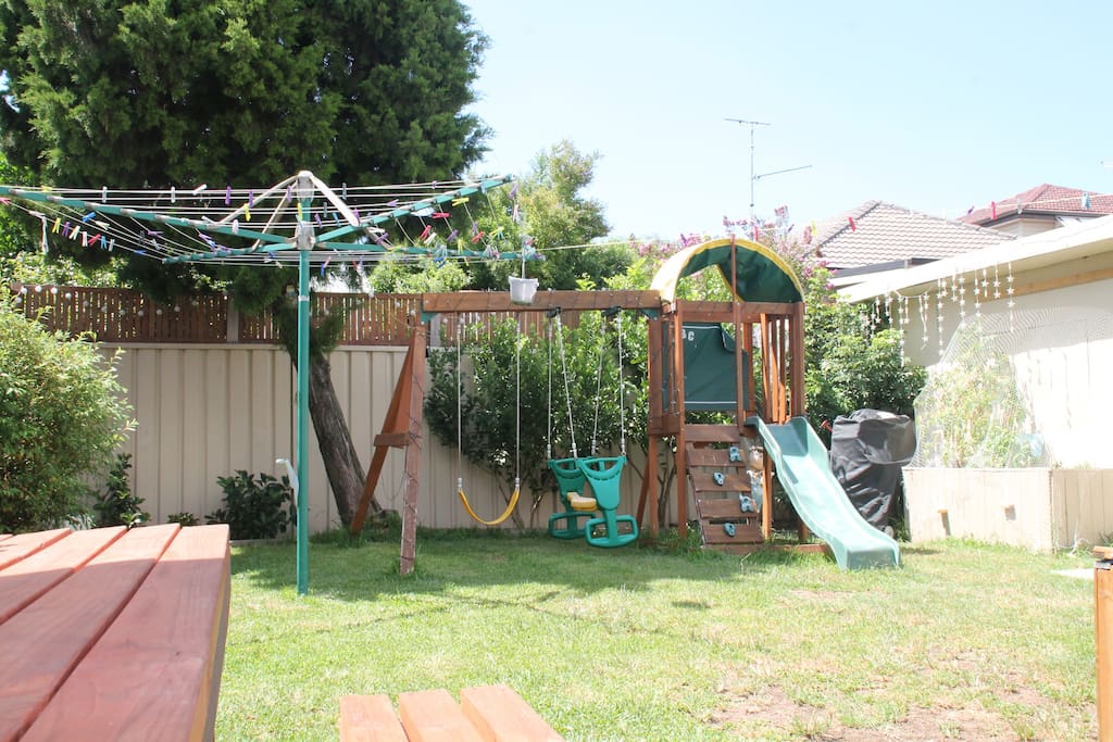 Spacious Garden with large garden Table, Benches, Umbrella