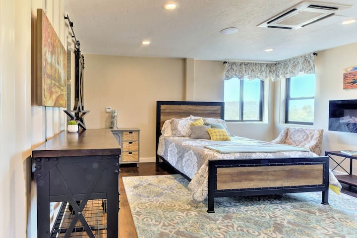 Enchanting master suite with luxurious furnishings and a very relaxing comfortable place to sit down by the nice romantic fire. 