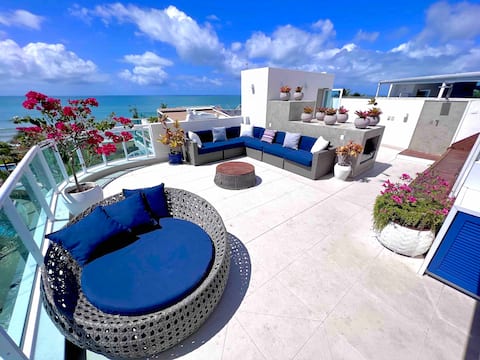 Duplex penthouse with a Jacuzzi right on the sand.