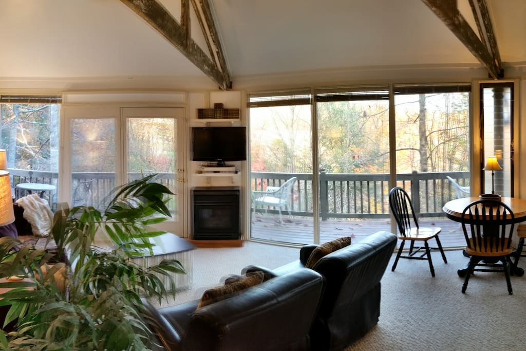 Window, windows, windows! The views from the living room/ kitchen area are of mountains and the dam in the fall and winter, and lush foliage in the summer.