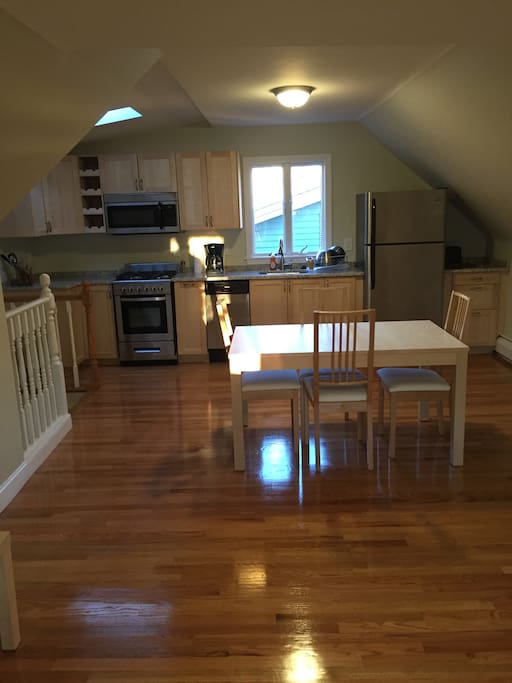 Kitchen and living area in the top floor of the home comfortable all equipped kitchen and beautiful nice light.