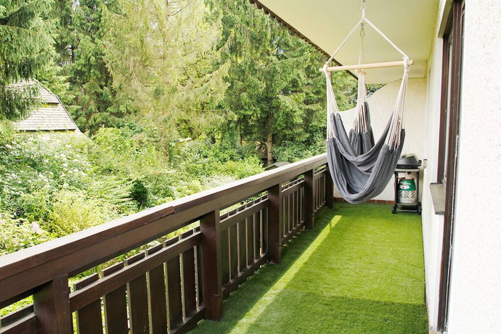 Balcony has artificial grass that feels nice under foot. Additional there are 2 single person hammocks and a gas BBQ.