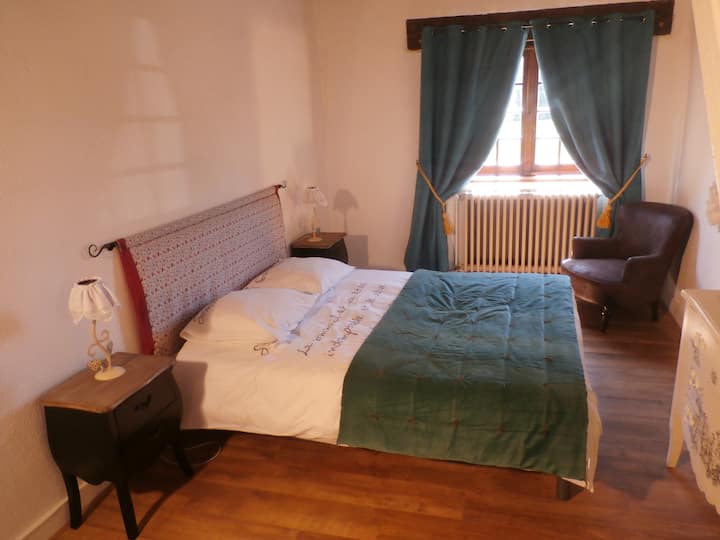 family suite. Bedroom with a 160 bed. A staircase in the bedroom leads  to another bedroom and a large bathroom , all forming a suite