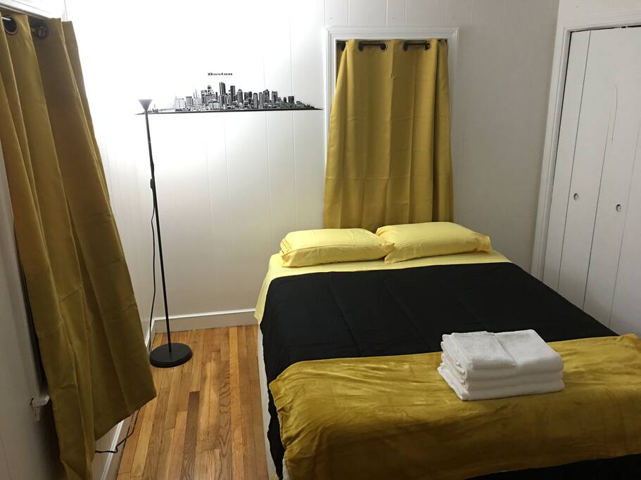 This room features thermal blackout curtains. It is nice and dark even when the sun is up.