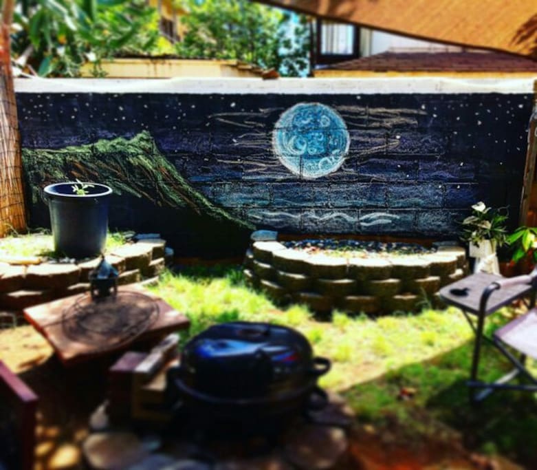 Back yard wall art and BBQ fire pit where night dinners often begin and good times roll!