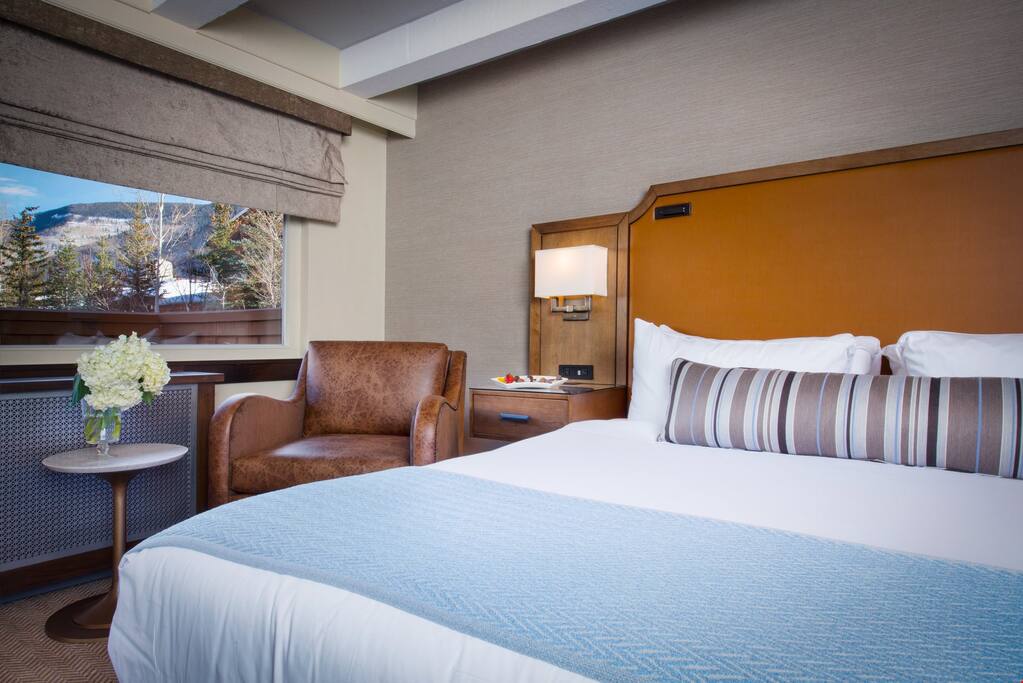 Appreciate stunning views from your serene and luxe bedroom.