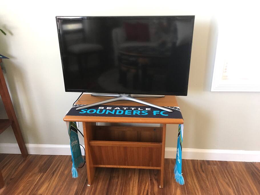 The TV does not have access to local or cable channels. However, you're welcome to log into your Netflix or Amazon Prime account during your stay, as it is a Smart TV.