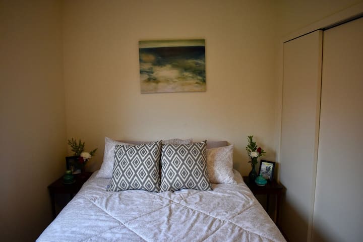 A brand new queen size bed with new bedding, lots of quality pillows, and a full closet and dresser. 