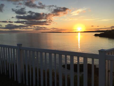 Paradise Awaits on the water’s edge, walk to town!