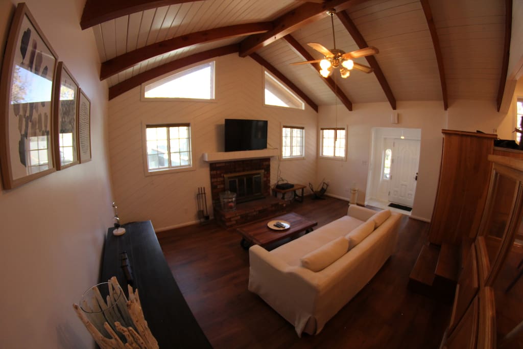 Living Room with Entryway, Wood Burning Fireplace, Smart TV, and Cable!