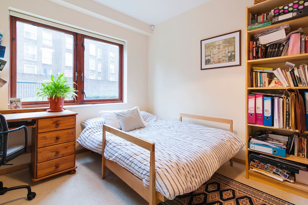 The bedroom which guests will use, with double-sized futon.
