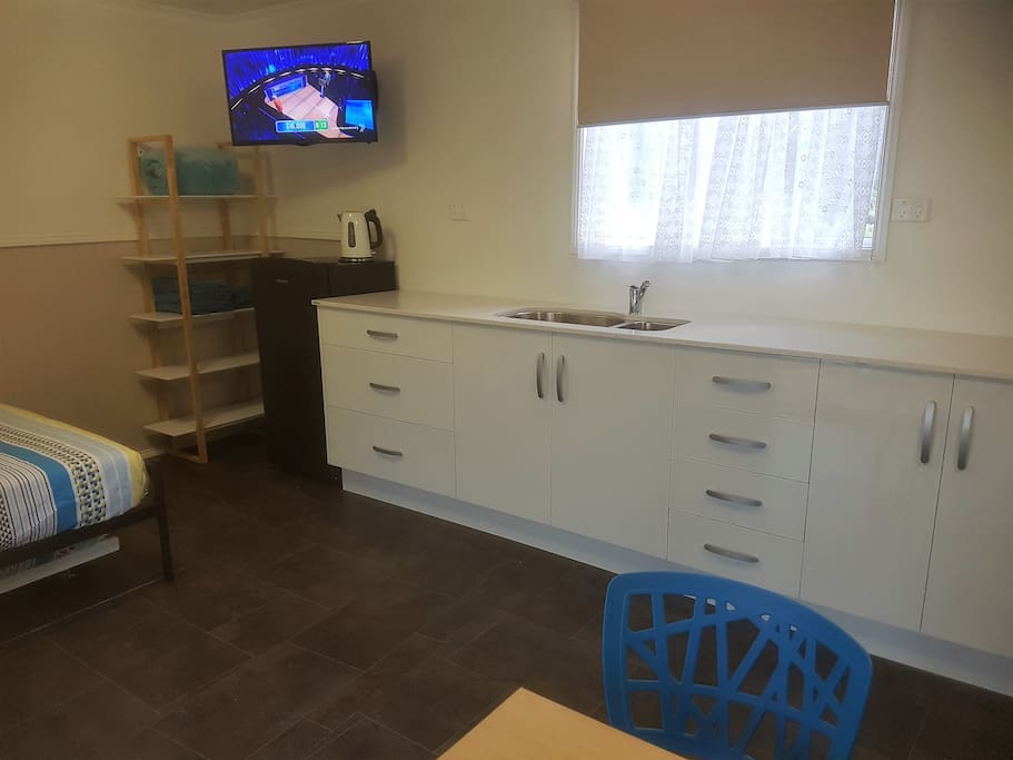 Kitchenette with Granite benchtop and all cooking facilities.