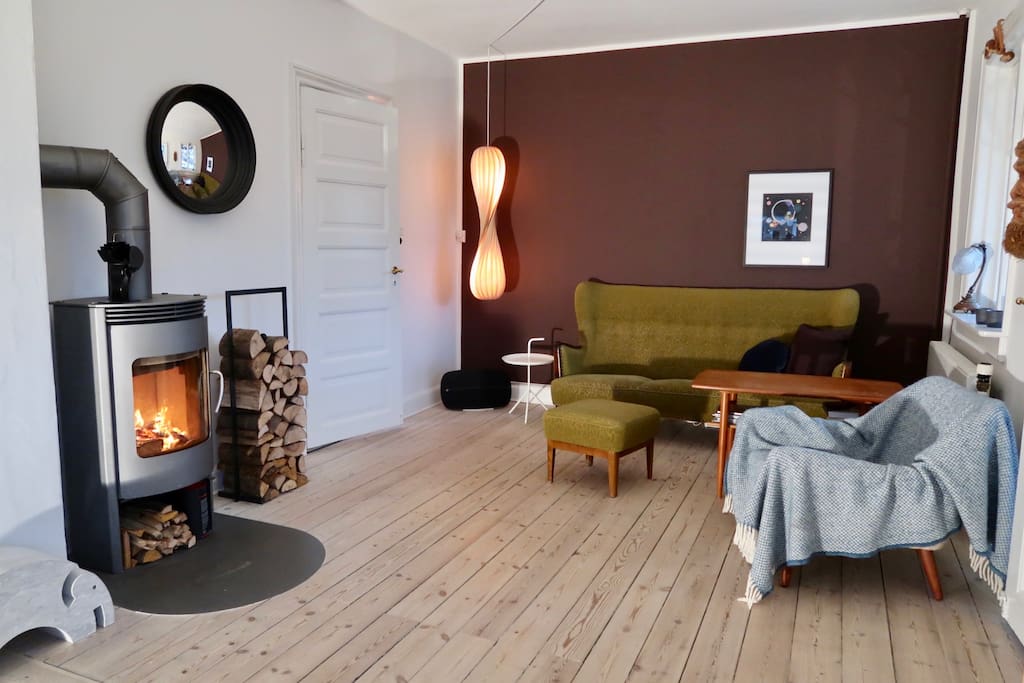 Charming living room with our cosy firestove