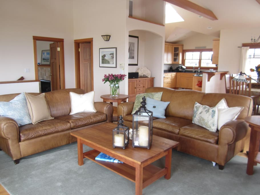 Living room upstairs to deck open floor plan kitchen dining