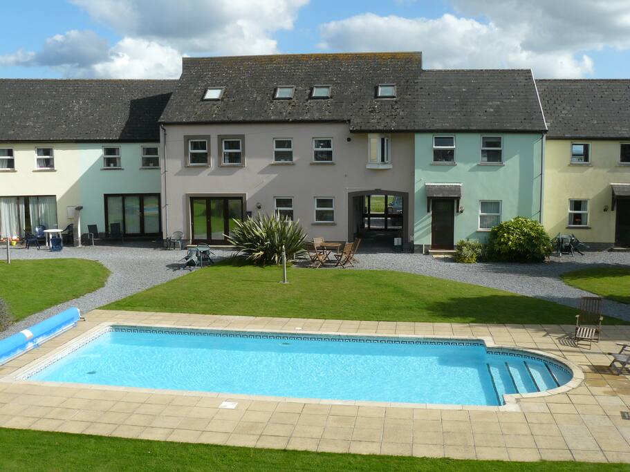 Innisfree House (in pink) with outdoor heated pool