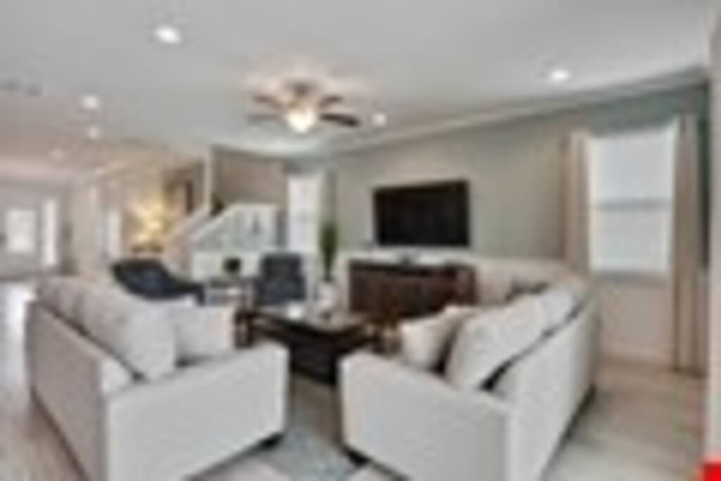 Gather in the lovely living room for movie night! - Pop a few bowls of popcorn, put a movie in, and settle in for a fun family night. The flat-screen TV keeps the group entertained any time of year!