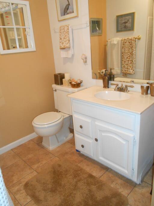 This is your private bath, with tub and shower. All the toiletries, hairdryer etc you may need .